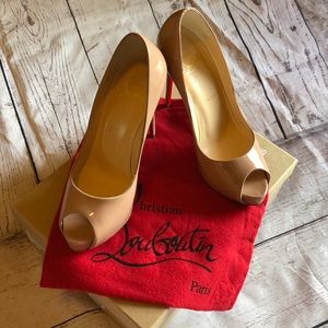 Worn once original christian Louboutin